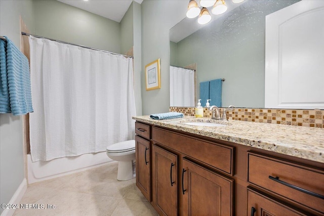 full bathroom with tasteful backsplash, vanity, shower / tub combo, toilet, and tile patterned floors