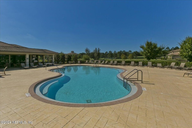 view of pool with a patio