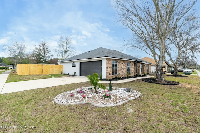 view of front of house featuring a garage and a front lawn