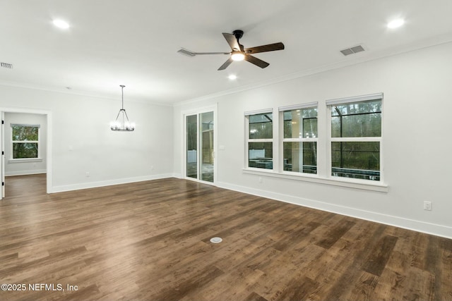 85158 Southern Creek Blvd, Fernandina Beach, FL 32034 - interior space featuring ceiling fan with notable chandelier, crown molding, and dark wood-type flooring