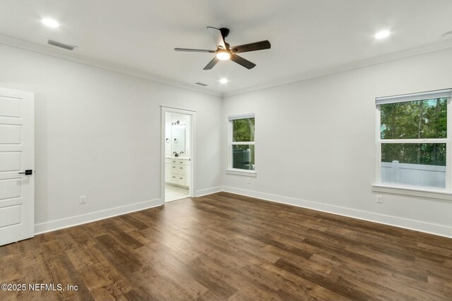 85158 Southern Creek Blvd, Fernandina Beach, FL 32034 - spare room with ceiling fan, dark wood-type flooring, and ornamental molding
