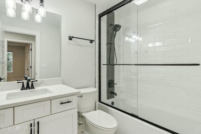 85158 Southern Creek Blvd, Fernandina Beach, FL 32034 - full bathroom with toilet, vanity, and bath / shower combo with glass door