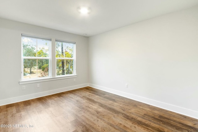 85158 Southern Creek Blvd, Fernandina Beach, FL 32034 - empty room featuring hardwood / wood-style flooring