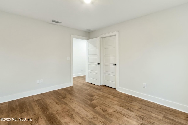 85158 Southern Creek Blvd, Fernandina Beach, FL 32034 - unfurnished bedroom with hardwood / wood-style flooring