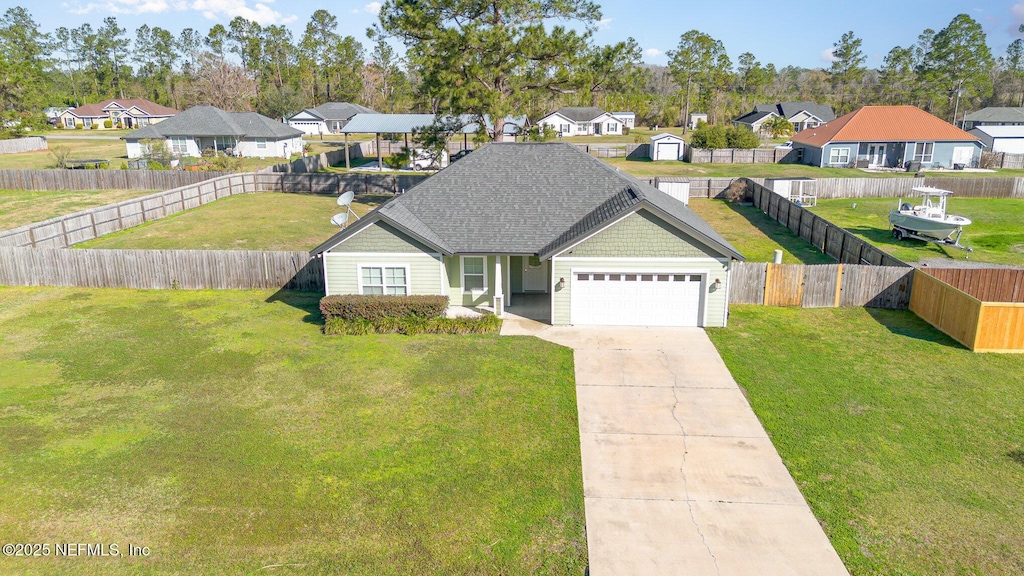 15054 SW 94th Cir, Lake Butler, FL 32054 - view of front facade featuring a garage and a front lawn