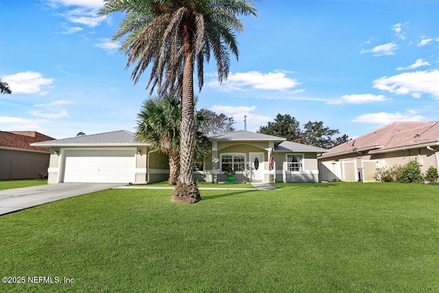 ranch-style home featuring metal roof, driveway, a front lawn, and an attached garage