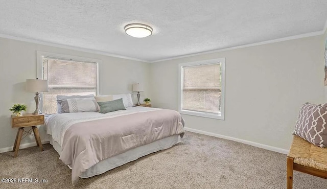 bedroom featuring ornamental molding, carpet, baseboards, and a textured ceiling