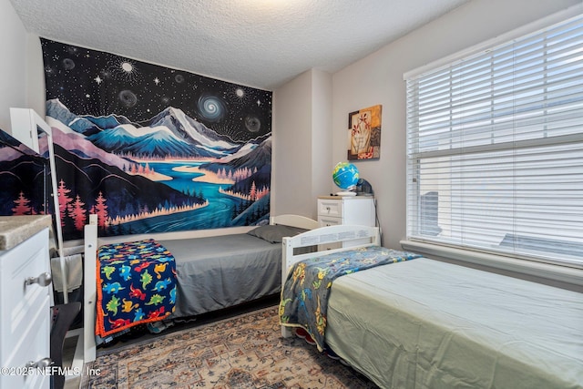 bedroom featuring a textured ceiling