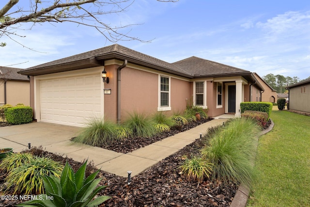 ranch-style house featuring a garage, roof with shingles, concrete driveway, and stucco siding