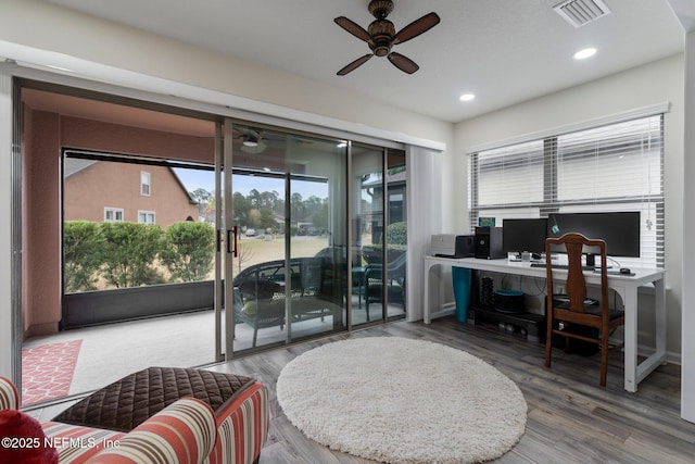 home office with recessed lighting, wood finished floors, visible vents, and a ceiling fan