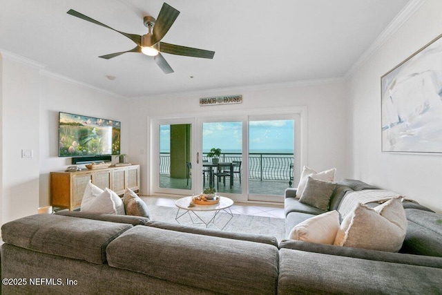 tiled living room with crown molding and ceiling fan