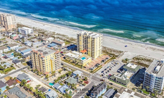 aerial view with a view of the beach and a water view