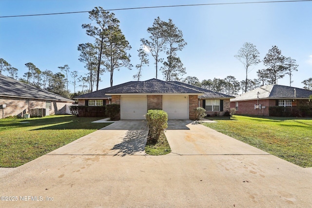 single story home with a front yard and a garage