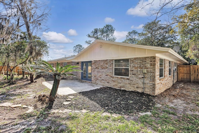 view of property exterior featuring a patio