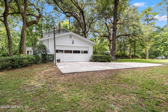 garage with a yard