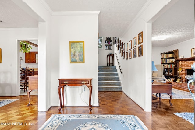 corridor featuring parquet flooring, ornamental molding, and a textured ceiling