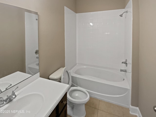 full bathroom with toilet, vanity, tile patterned flooring, and washtub / shower combination
