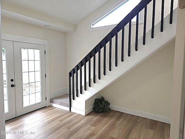 foyer with hardwood / wood-style floors