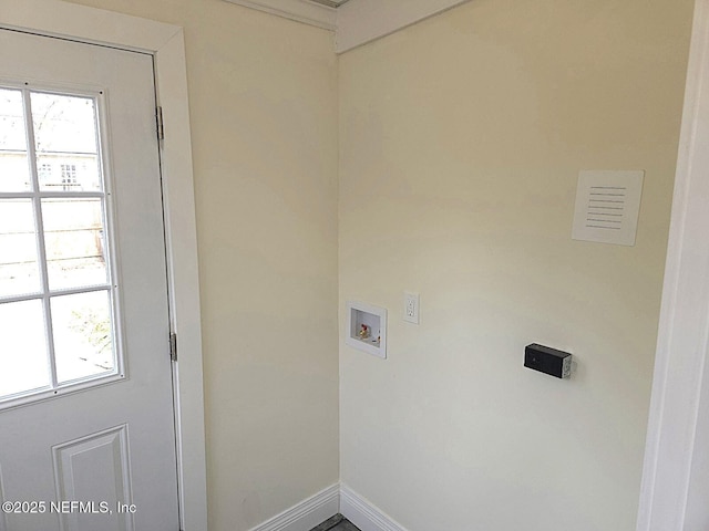 washroom featuring hookup for a washing machine and plenty of natural light