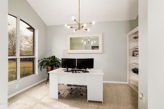 carpeted office with a chandelier