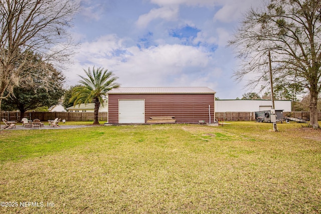 garage with a lawn