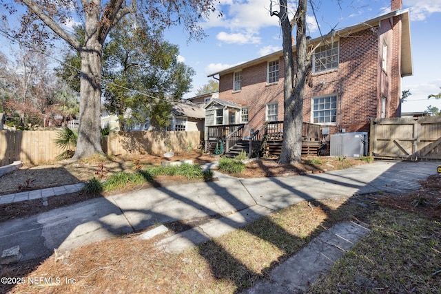 rear view of house with a deck