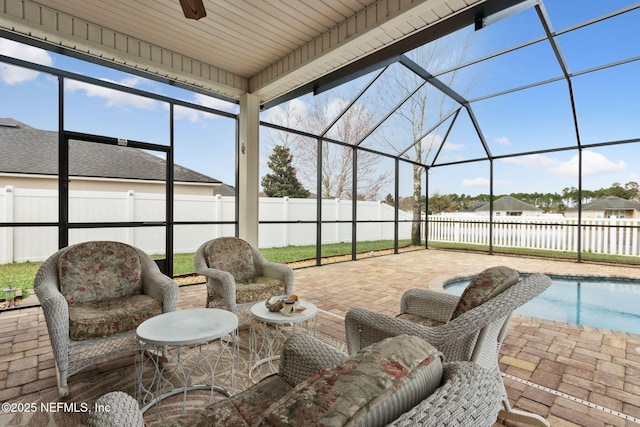 view of patio featuring a fenced in pool and a lanai