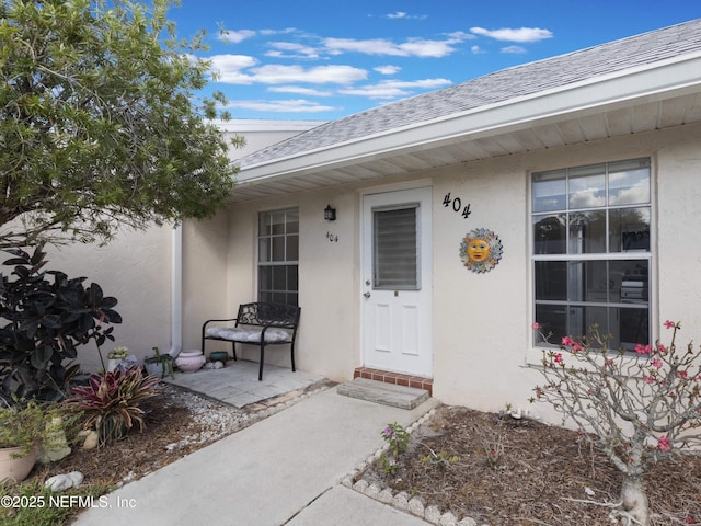 entrance to property with a patio area