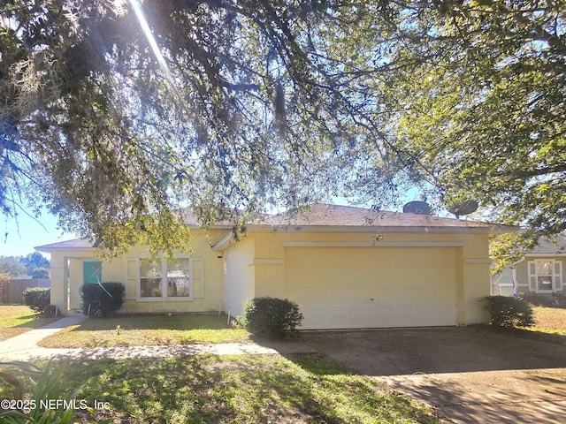 single story home featuring a garage