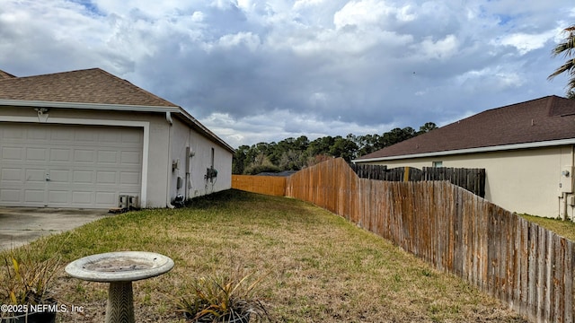 view of home's exterior with fence, a lawn, and stucco siding