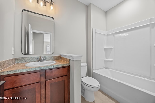 bathroom with toilet and vanity