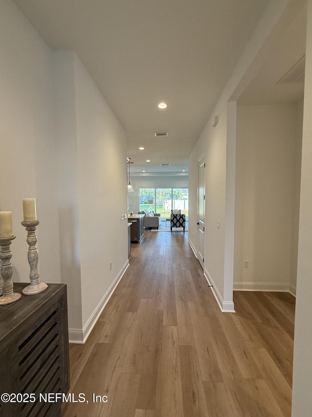 hall featuring light wood-type flooring