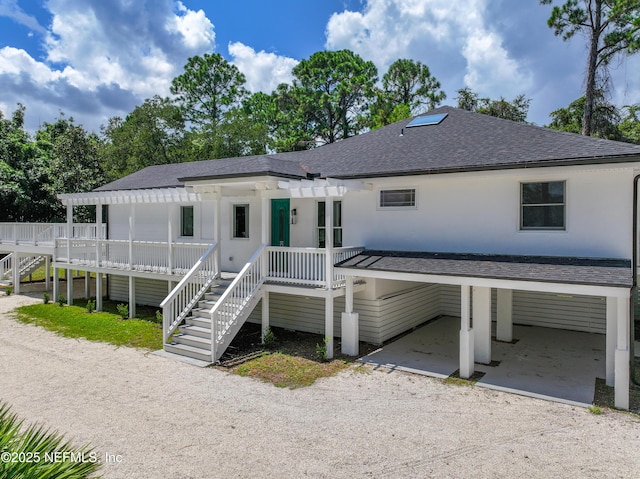 view of front of house featuring a carport