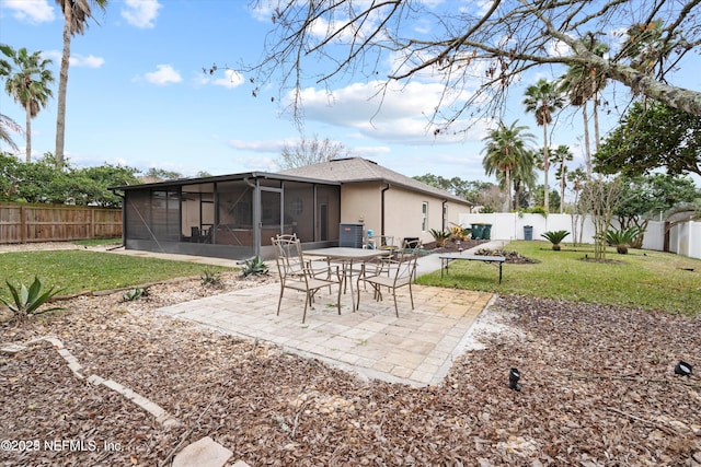 view of patio / terrace featuring a fenced backyard and a sunroom