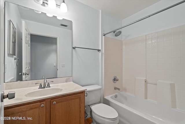 full bathroom with visible vents, toilet, shower / bath combination, and vanity