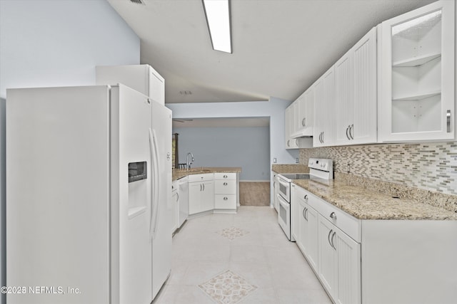 kitchen featuring white cabinetry, white appliances, light tile patterned flooring, and glass insert cabinets