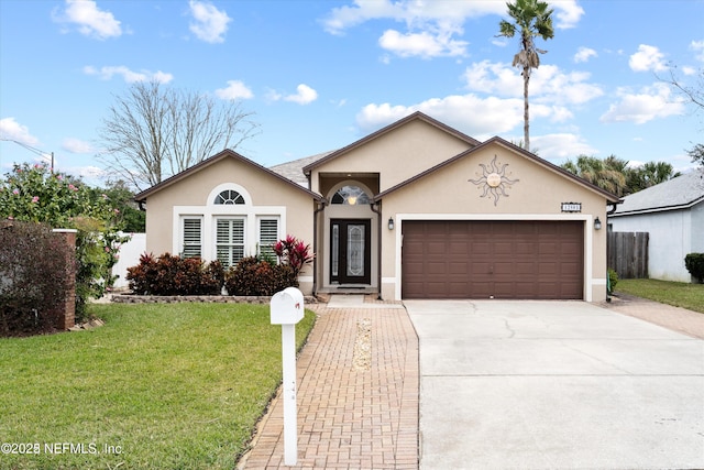 12503 Ash Harbor Dr, Jacksonville, FL 32224 - ranch-style house with stucco siding, an attached garage, concrete driveway, and a front yard