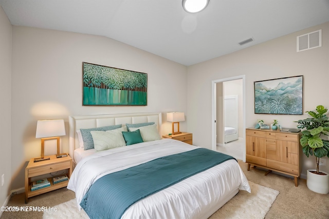 bedroom featuring lofted ceiling, baseboards, visible vents, and carpet flooring