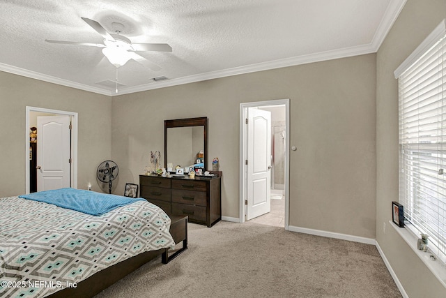 carpeted bedroom with ceiling fan, ornamental molding, a textured ceiling, and ensuite bathroom