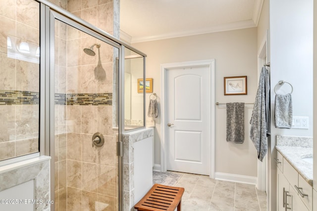 bathroom featuring vanity, crown molding, and a shower with door