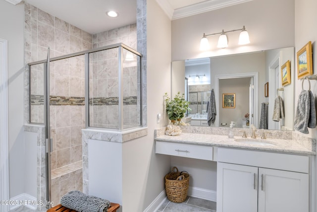 bathroom featuring crown molding, a shower with shower door, vanity, and tile patterned flooring