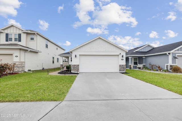 craftsman-style home featuring a garage, concrete driveway, stone siding, and a front lawn