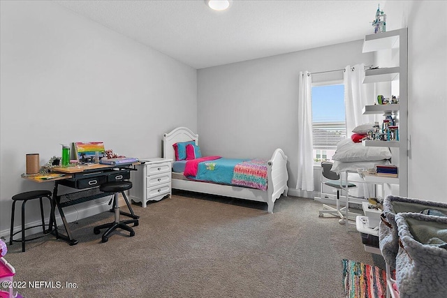 bedroom featuring dark colored carpet