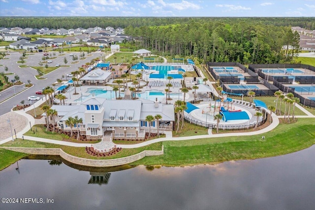 drone / aerial view with a water view