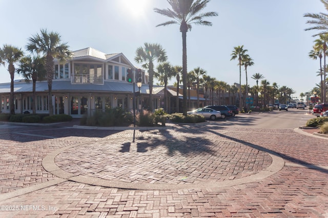 exterior space with sidewalks and curbs