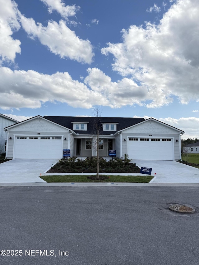 15 Wimbledon Way, Palm Coast, FL 32164 - view of front of house with a garage and concrete driveway