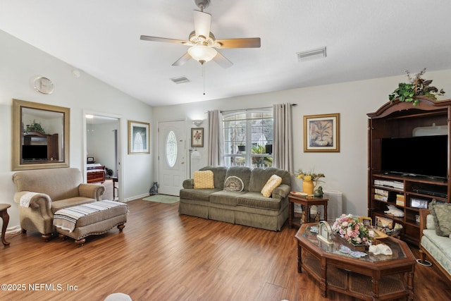 37069 Lee St, Hilliard, FL 32046 - living room with hardwood / wood-style flooring, vaulted ceiling, and ceiling fan