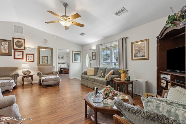 37069 Lee St, Hilliard, FL 32046 - living room with hardwood / wood-style floors, vaulted ceiling, and ceiling fan