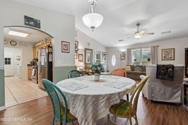 37069 Lee St, Hilliard, FL 32046 - dining space featuring lofted ceiling, washer / clothes dryer, light hardwood / wood-style flooring, and ceiling fan