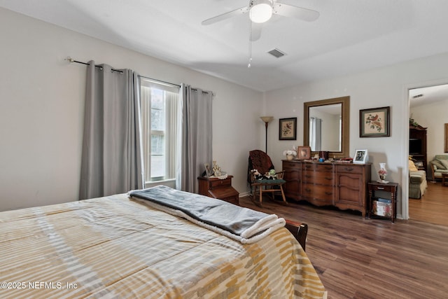37069 Lee St, Hilliard, FL 32046 - bedroom with dark wood-type flooring and ceiling fan